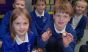 Emmett & Sophia bringing chestnuts/conkers to share with the class
